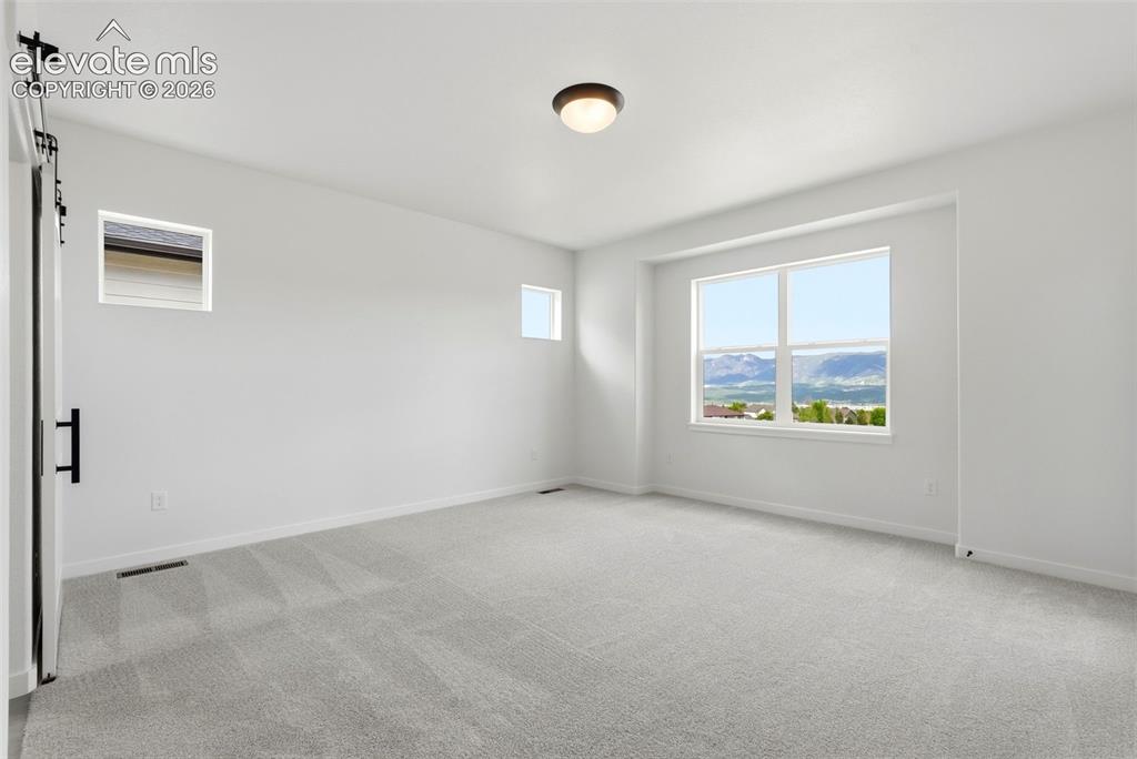Image 17 of 50: Master Bedroom