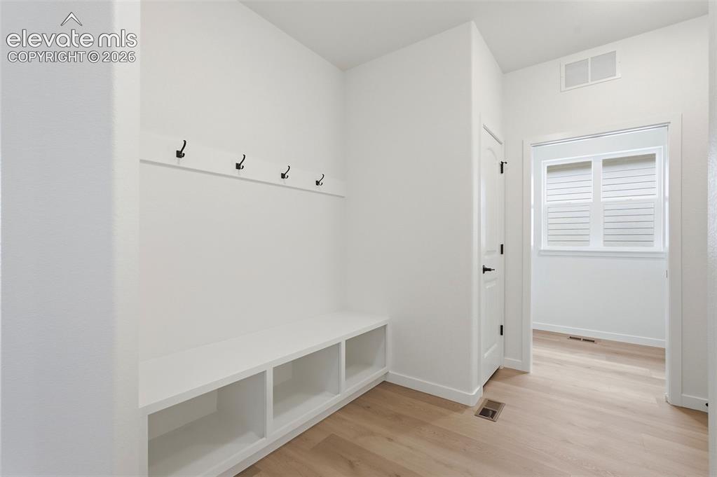 Image 24 of 50: Primary Bedroom Walk-in Closet
