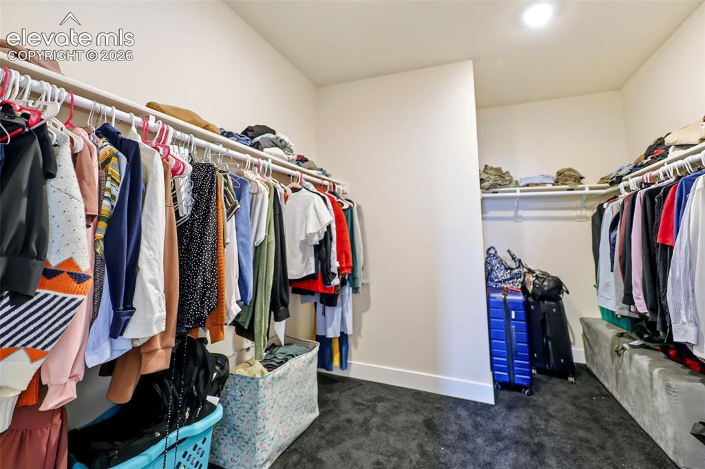 Image 19 of 49: The laundry room is conveniently located on the main-level and the washer a