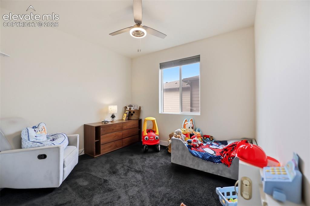 Image 22 of 49: A large full bathroom adjacent to the main level bedrooms. 
