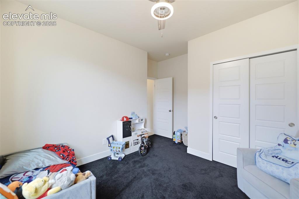 Image 23 of 49: The lower level provides a large family room space, including a separate re