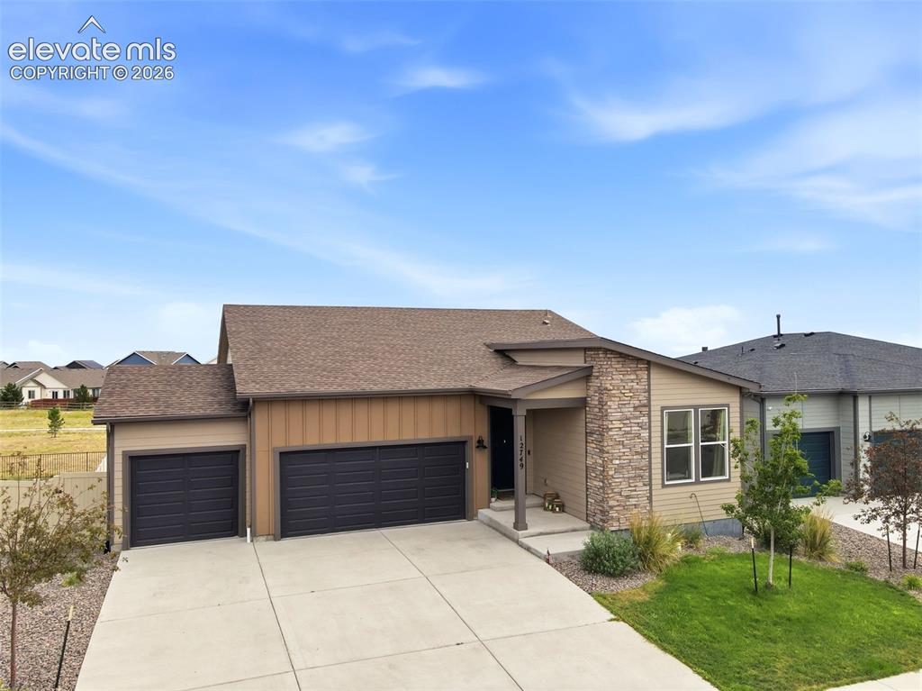 Image 3 of 49: Enjoy the natural light and stunning hardwood flooring throughout the livin