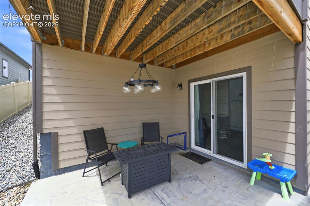 Image 37 of 49: Aerial view displays the open space behind the home!