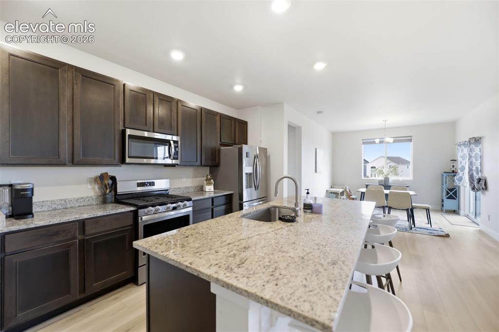 Image 8 of 49: A large pantry provides extra space for your kitchen and cooking necessitie