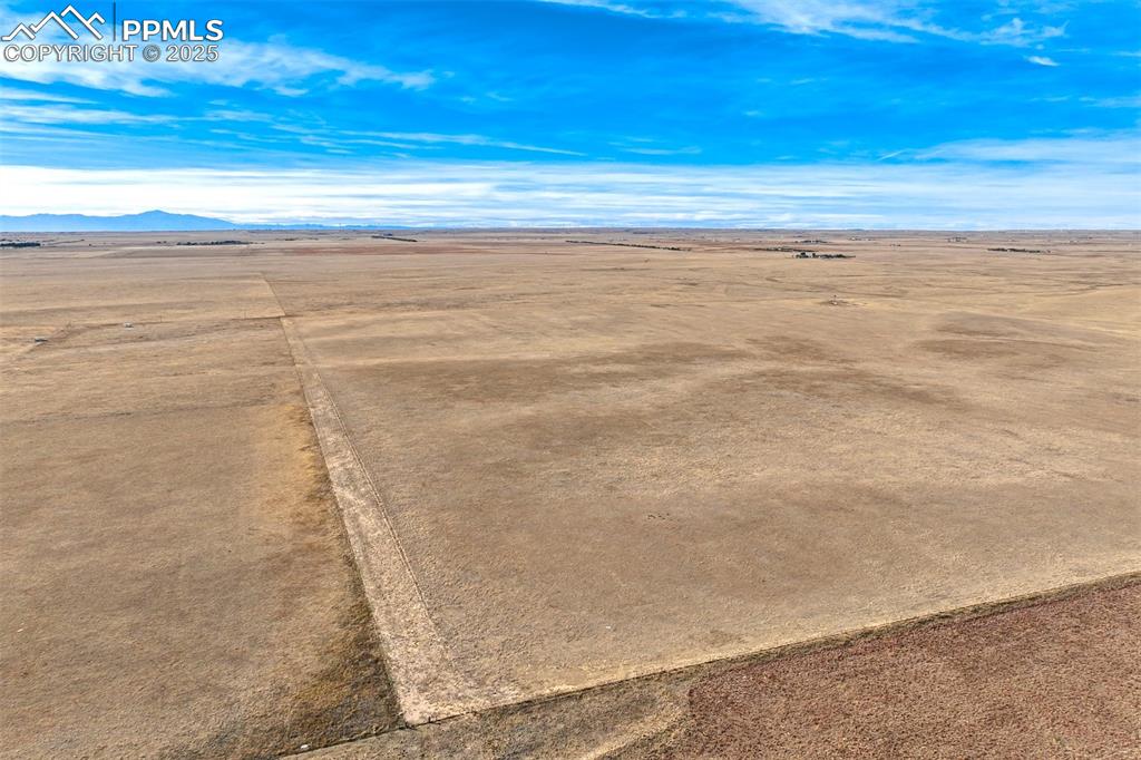 Image 14 of 30: View of rural area with a desert landscape
