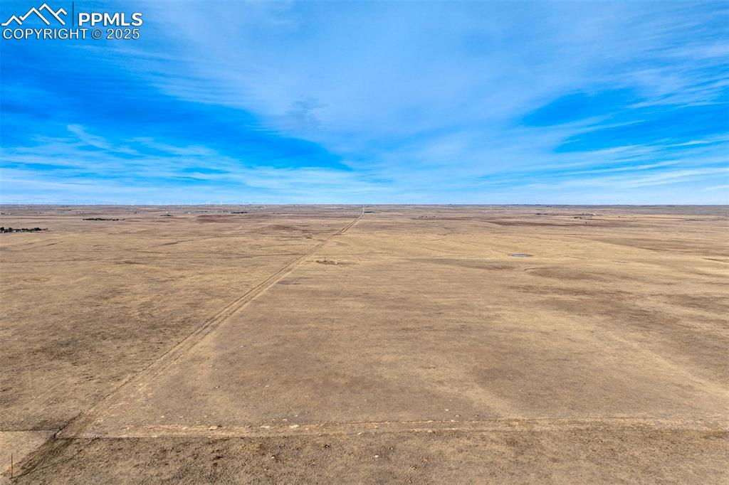 Image 16 of 30: View of rural area with a desert landscape