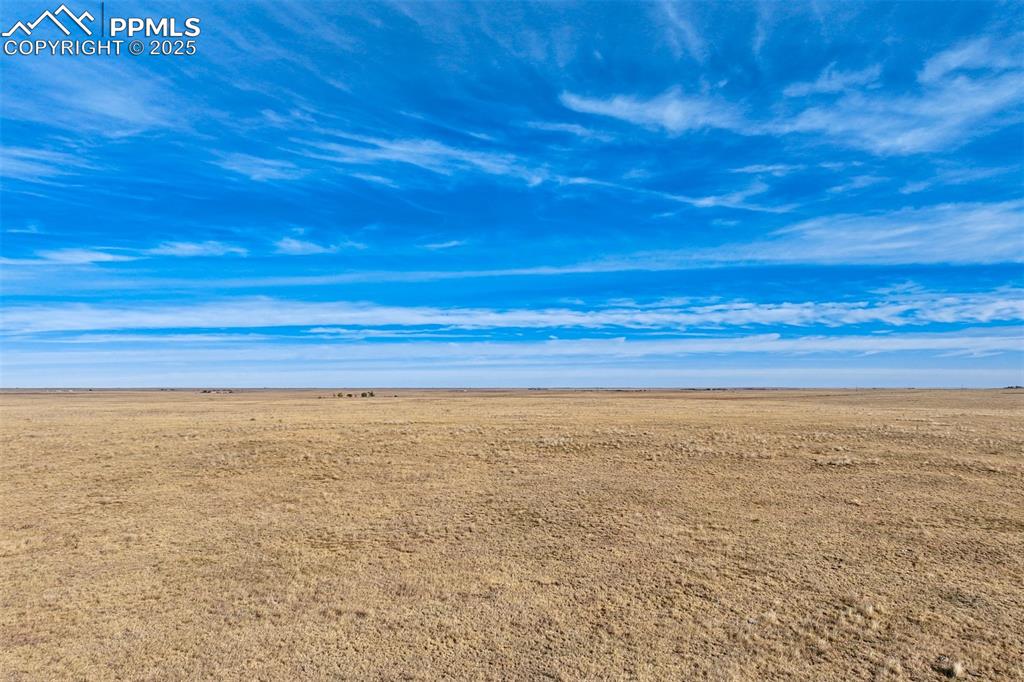 Image 27 of 30: View of undeveloped land with rural landscape