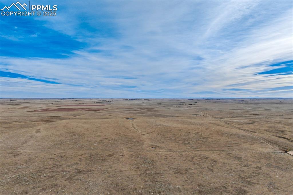 Image 29 of 30: View of rural area with a desert landscape