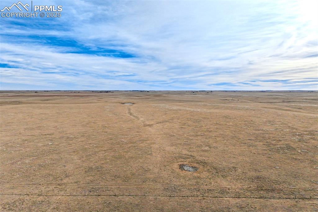 Image 5 of 30: View of rural area featuring a desert landscape