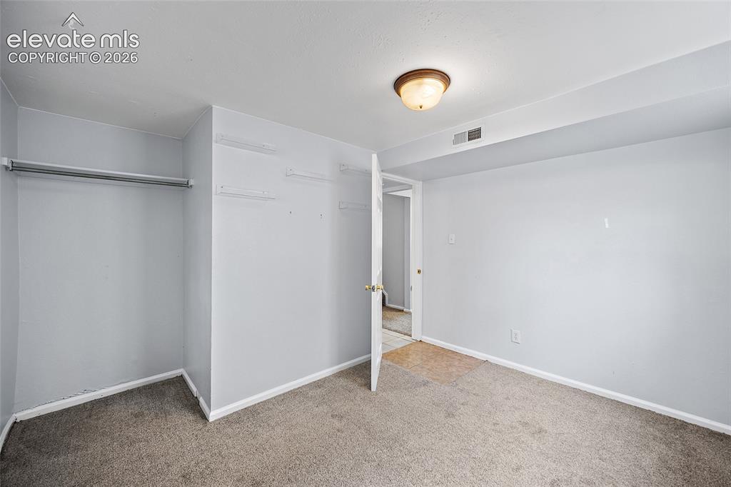 Image 19 of 26: Bedroom