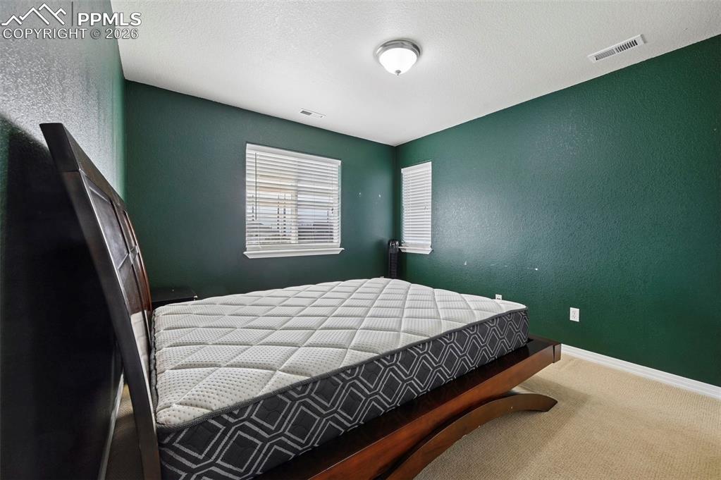 Image 21 of 38: Bedroom