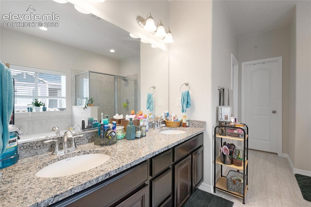 Image 12 of 28: Master Bathroom