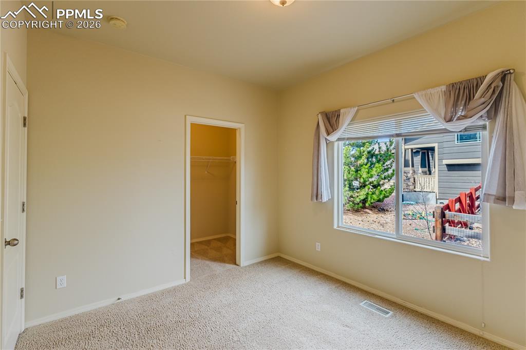 Image 12 of 37: Main Level Second Bedroom