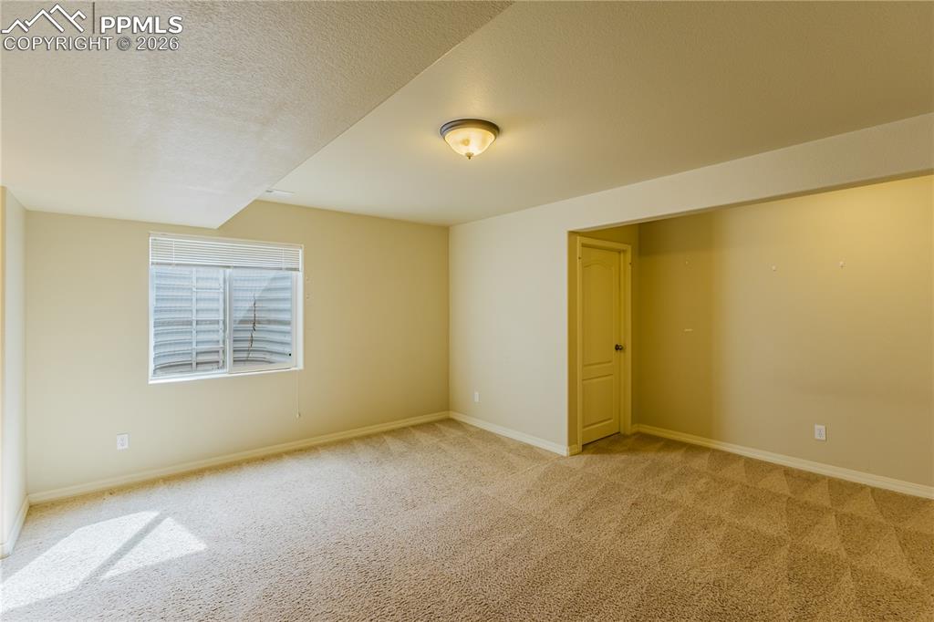 Image 20 of 37: Basement Bedroom