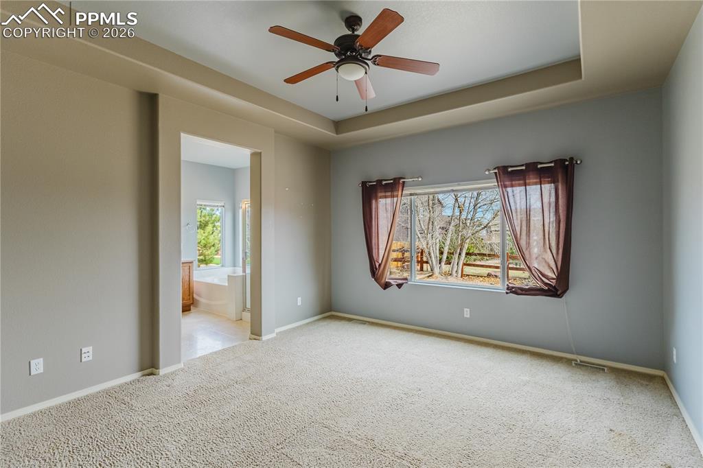 Image 9 of 37: Main Level Master Bedroom