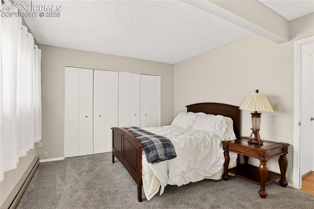 Image 11 of 25: Bedroom 1 w/ en-suite bath - main level