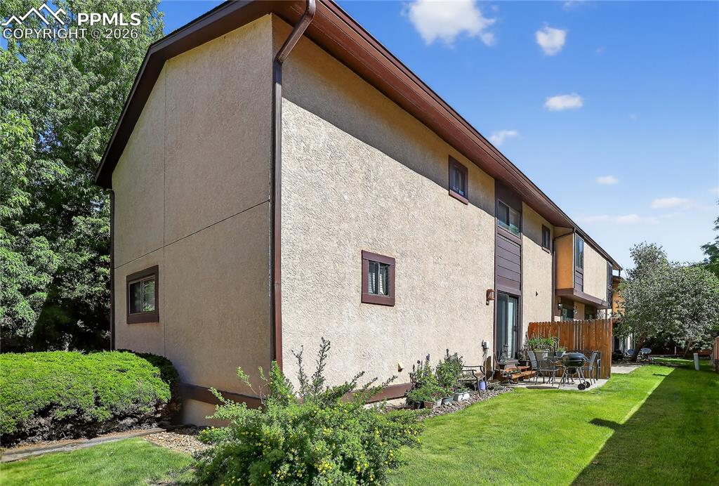 Image 25 of 25: View of property exterior featuring stucco siding, and a patio