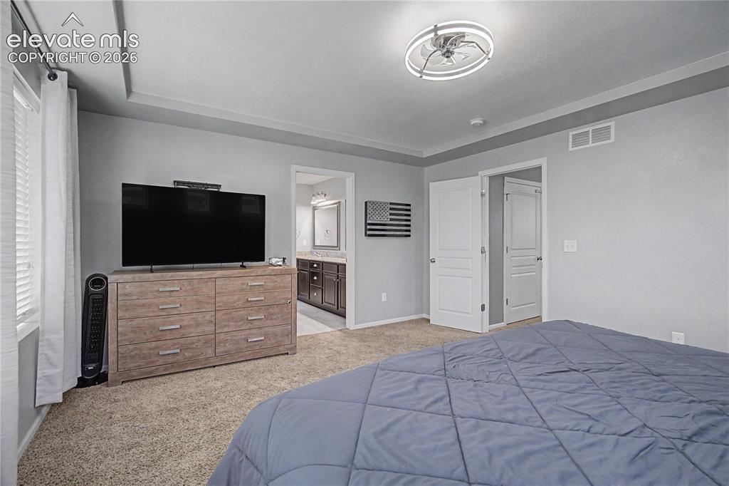 Image 17 of 40: Master Bedroom Adjoins Bath