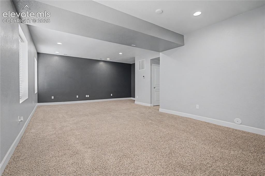 Image 27 of 40: Basement Family Room