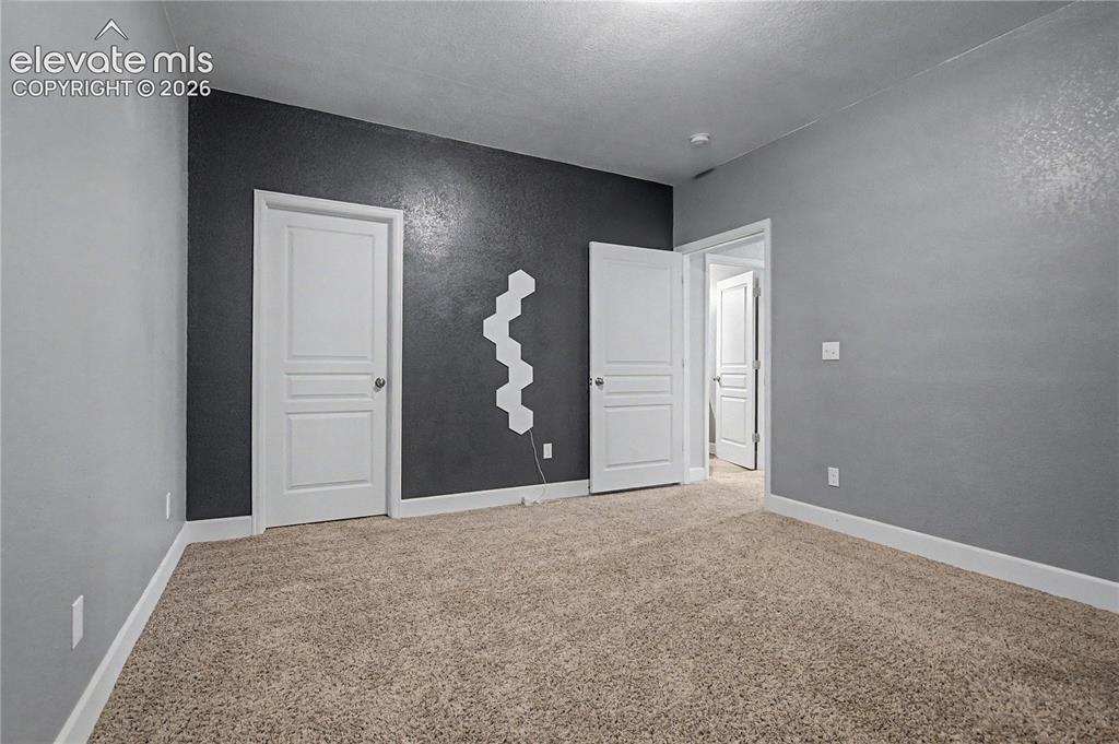 Image 31 of 40: Basement Bedroom w/Walk-in Closet!