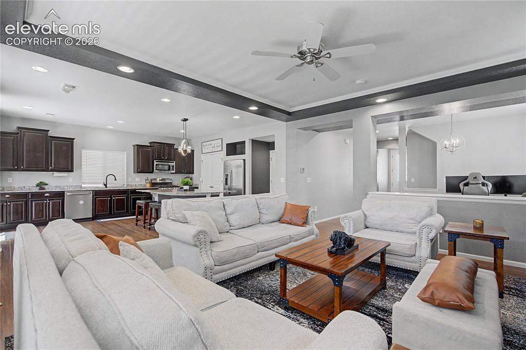 Image 9 of 40: Living Room Open to
the Kitchen!