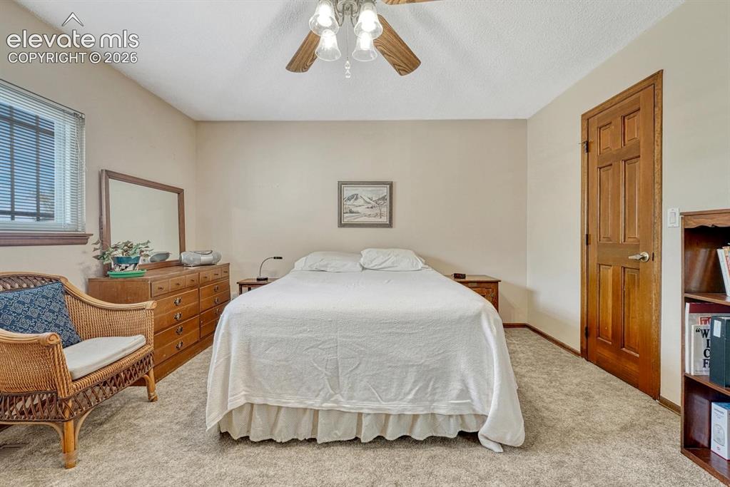 Image 12 of 48: Primary bedroom has walk-in closet and attached ¾ bathroom.