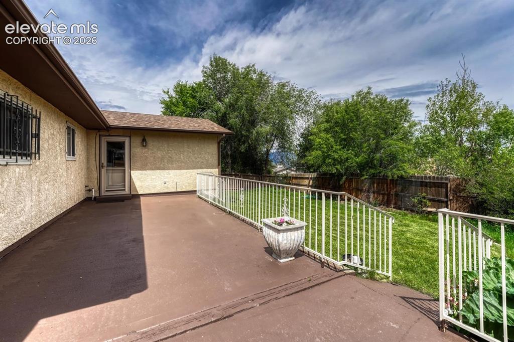 Image 36 of 48: Large concrete patio perfect for outdoor entertaining or enjoying the beaut