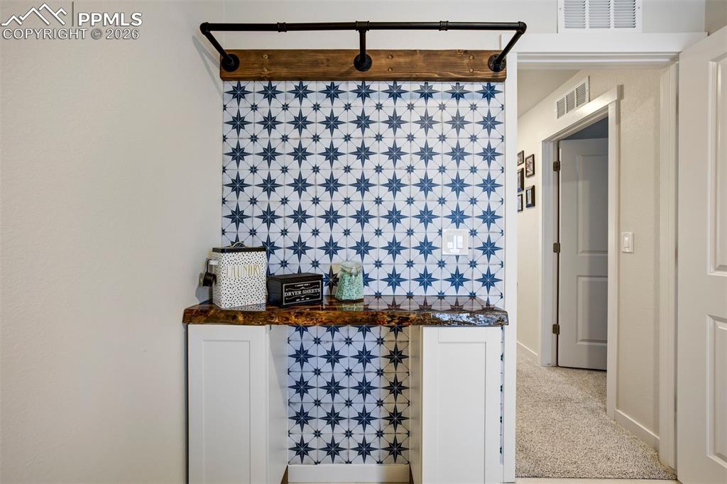 Image 24 of 45: Upstairs Laundry Room