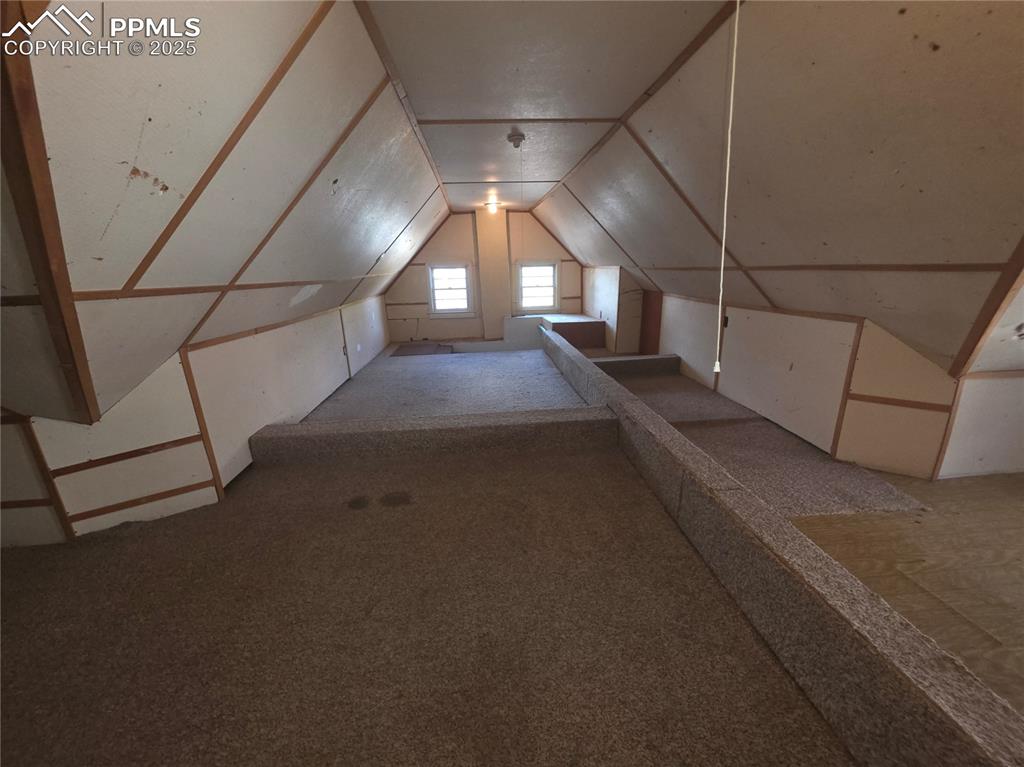 Image 25 of 37: UPPER LEVEL - BEDROOM, OFFICE, LIVING SPACE, STORAGE