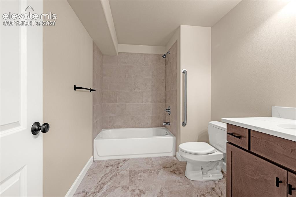 Image 30 of 42: Basement bathroom is large and updated. New flooring, new cabinets, new ti