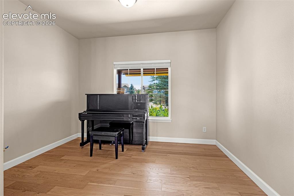 Image 7 of 42: Home Center/Flex area off the Kitchen. Makes for a great dining room or 2n