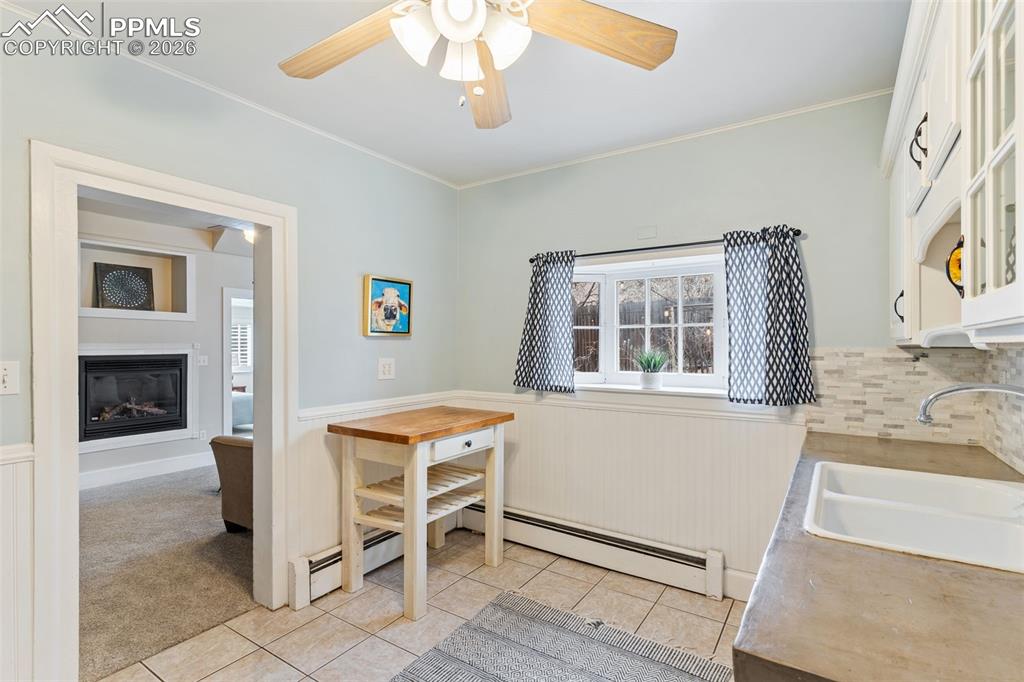 Image 17 of 36: Pretty kitchen with cute, original bay window.
