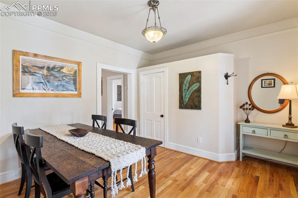 Image 9 of 36: Charming entry has also been used over the years as a dining room.