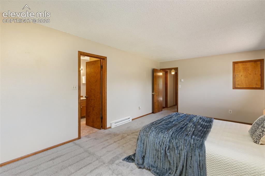 Image 34 of 47: Master Bedroom