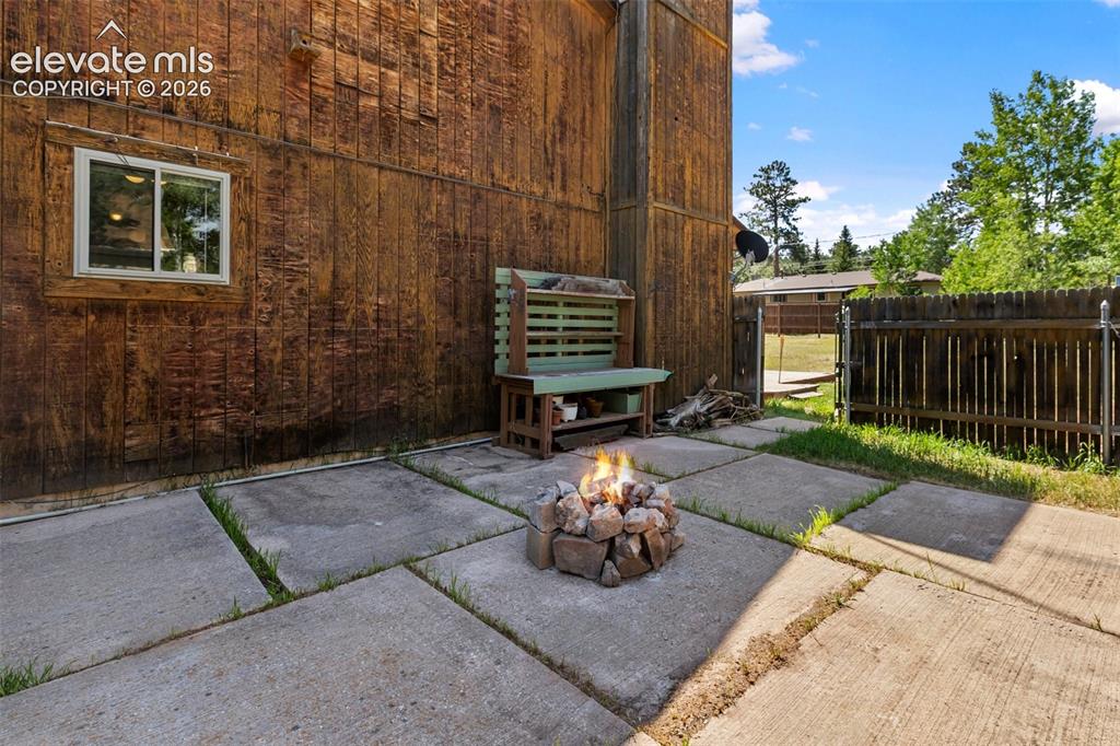 Image 44 of 47: Backyard fire pit- glorious Colorado living!