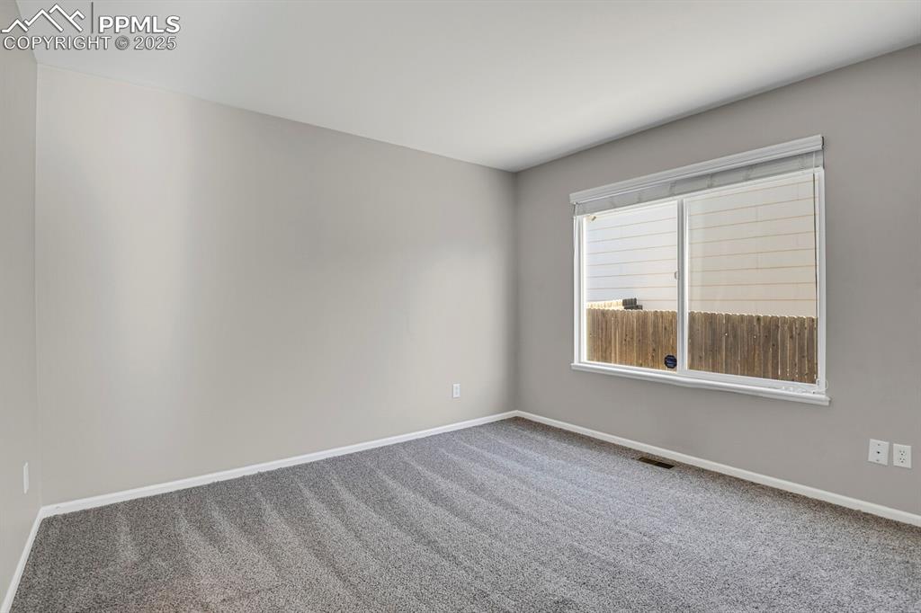 Image 18 of 38: Bedroom