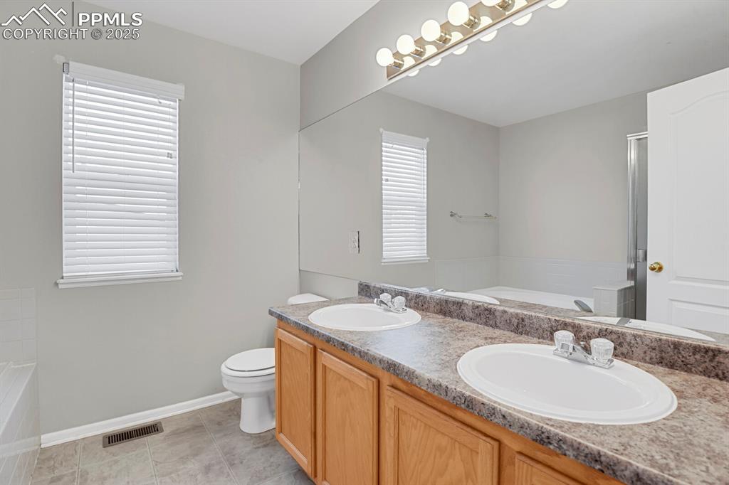 Image 22 of 38: Master Bathroom