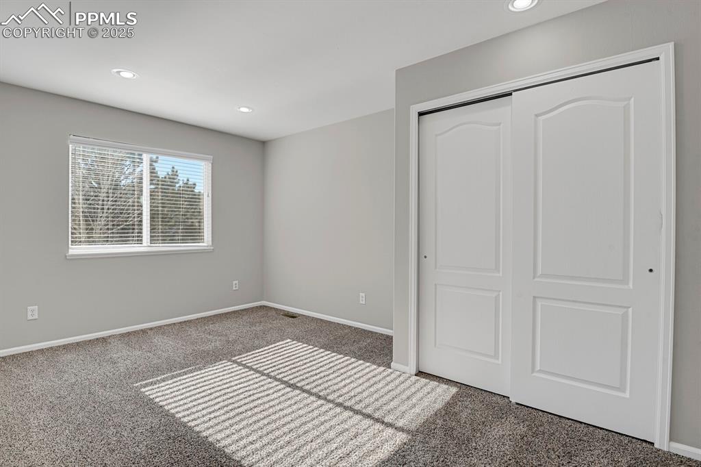 Image 30 of 38: Bedroom