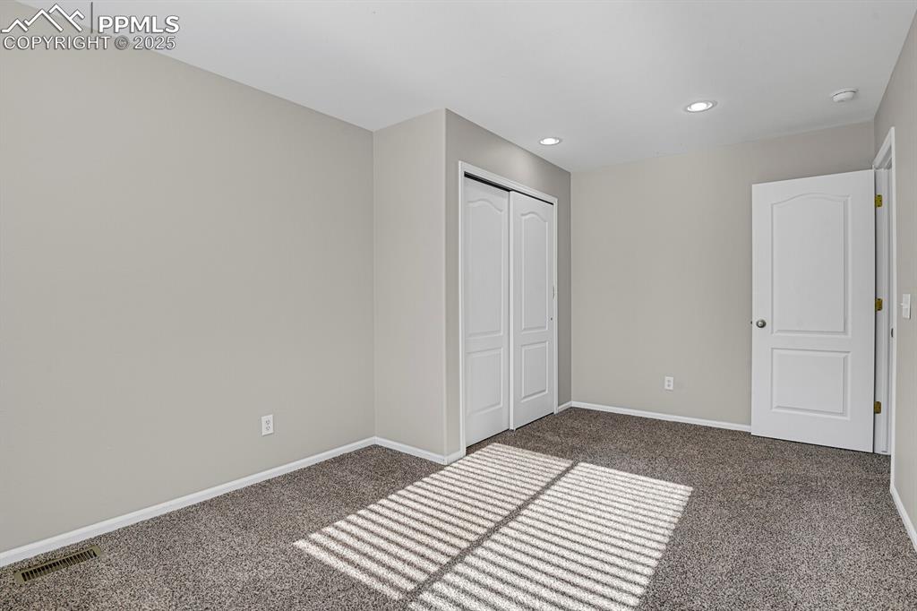 Image 31 of 38: Bedroom