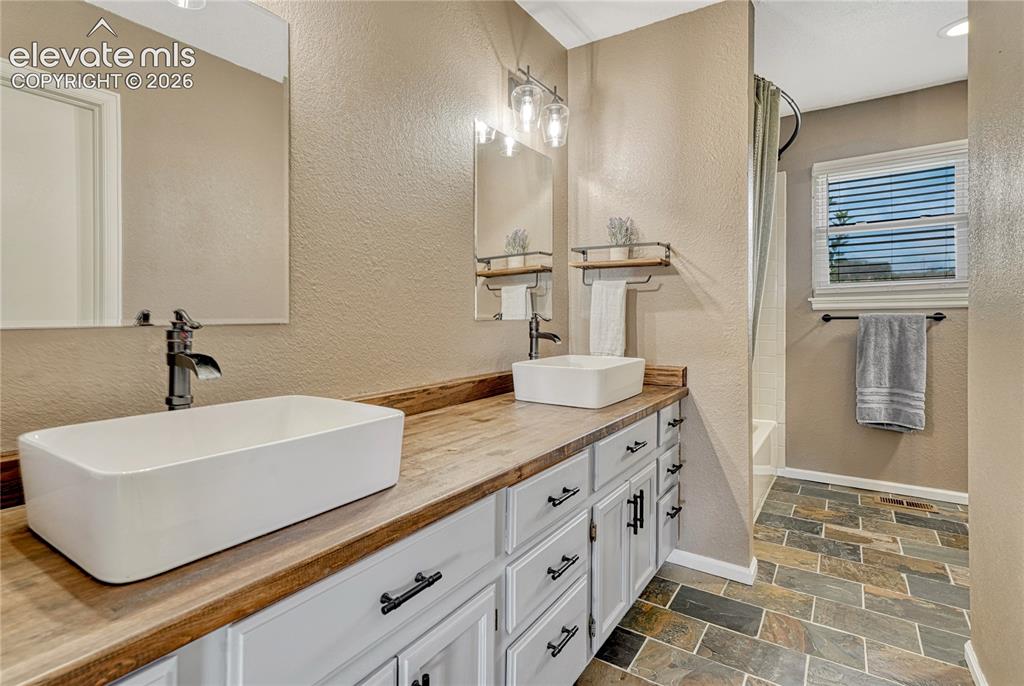 Image 15 of 50: Master Bathroom