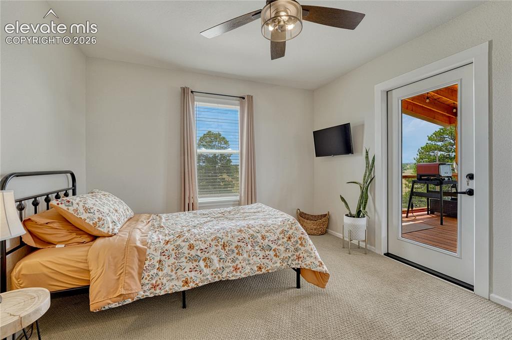 Image 20 of 50: Additional Bedroom with deck access