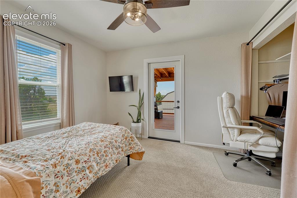 Image 21 of 50: Additional Bedroom with deck access
