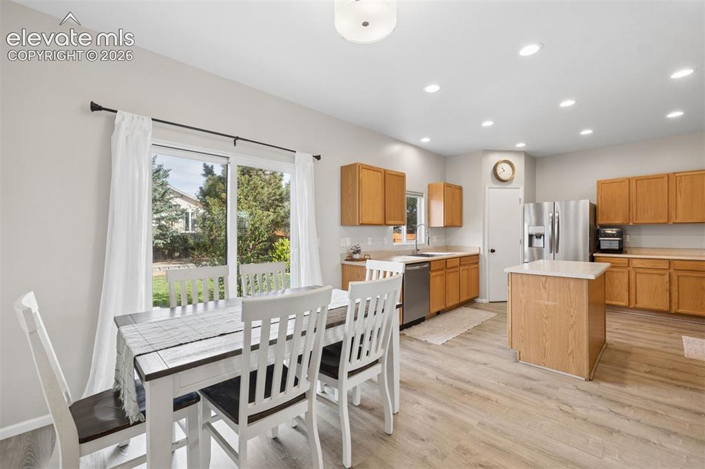 Image 12 of 43: Dedicated dining area with walkout access