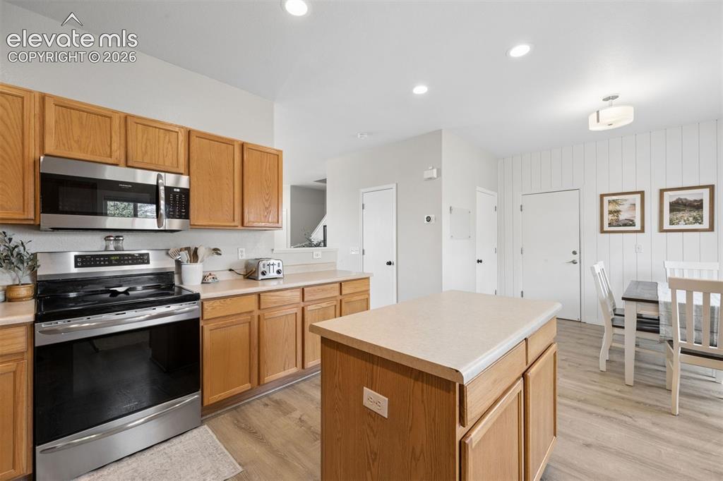 Image 13 of 43: Large kitchen with center island