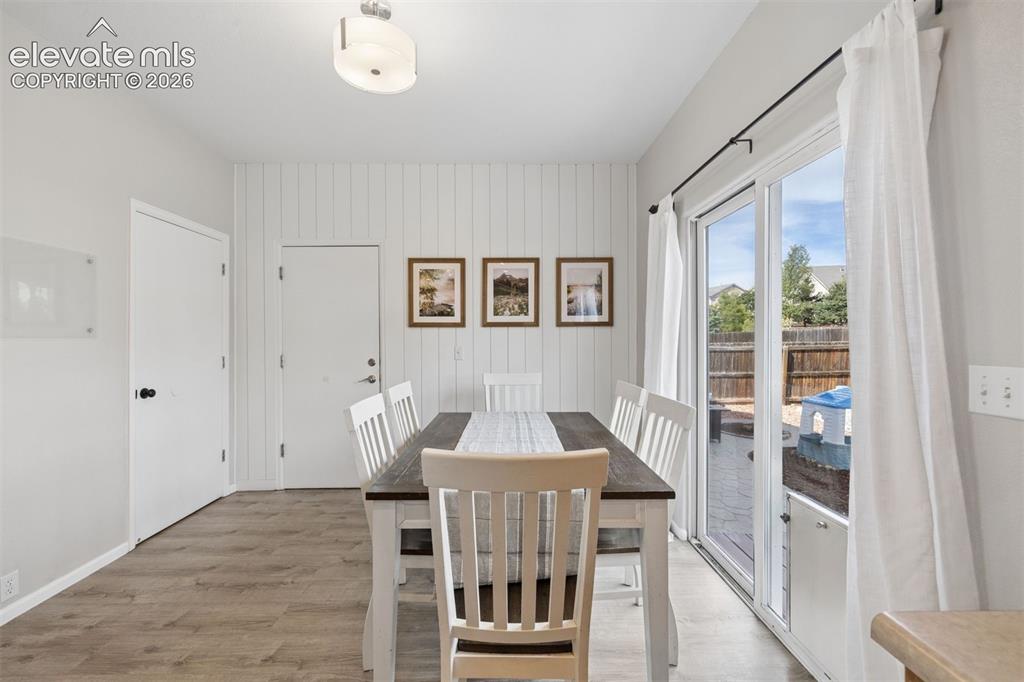 Image 14 of 43: Dedicated dining area with walkout access