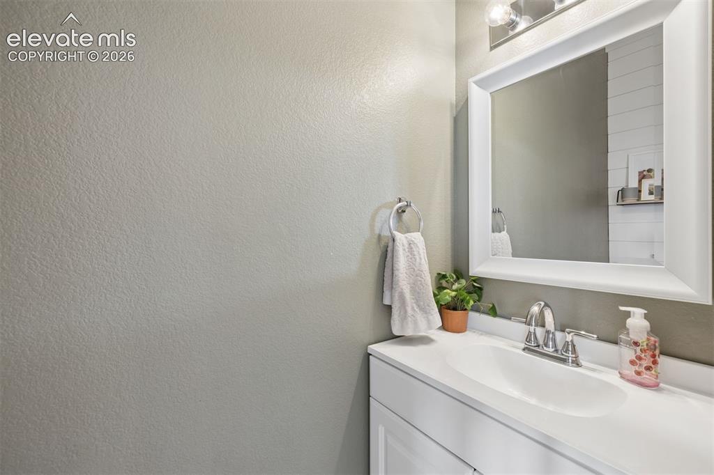 Image 21 of 43: Main floor half bathroom