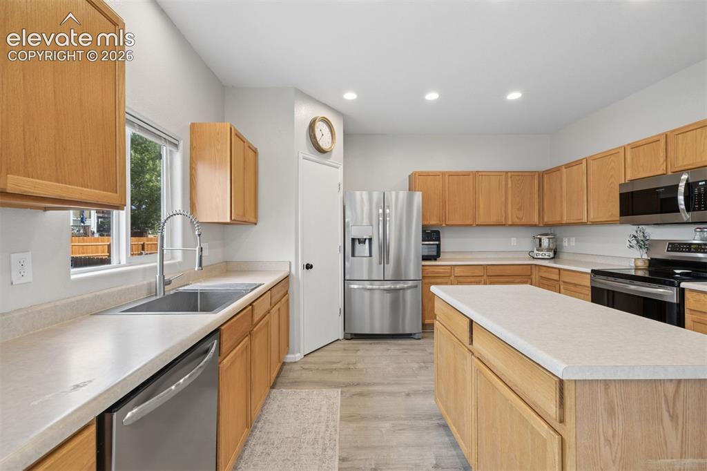 Image 9 of 43: Large kitchen with center island