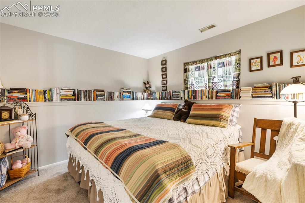 Image 26 of 36: View of carpeted bedroom