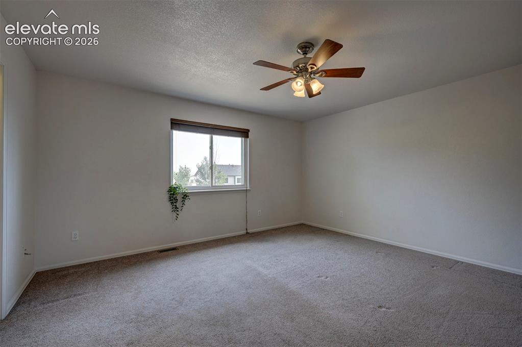 Image 14 of 28: Master Bedroom