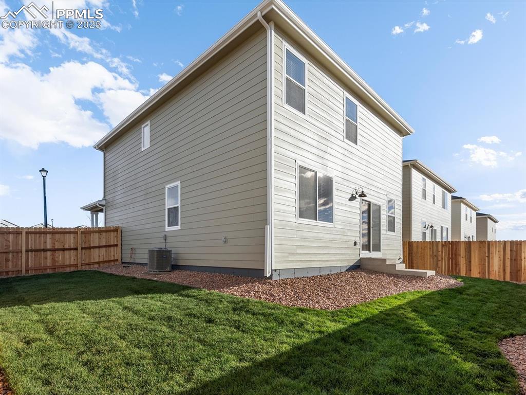 Image 24 of 25: Rear view of property